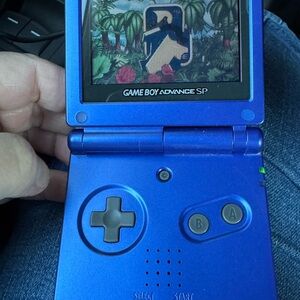 Vintage Nintendo Blue Game Boy Advance SP Handheld Console with Donkey Kong game